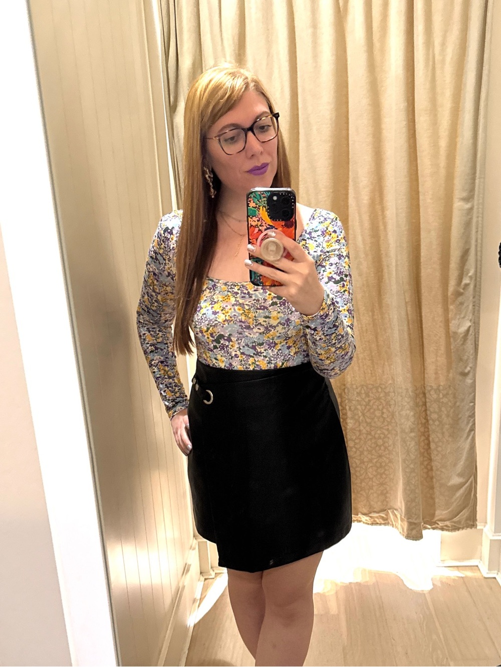 Francesca’s Black Faux Leather Side Buckle Mini Skirt